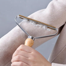 Load image into Gallery viewer, Portable Lint Remover Clothes Fuzz Fabric Shaver Brush Tool Power-Free Fluff Removing Roller for Sweater Woven Coat
